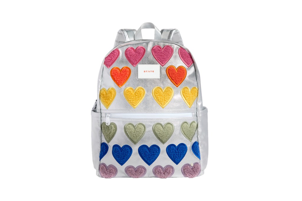 A backpack with hearts on it